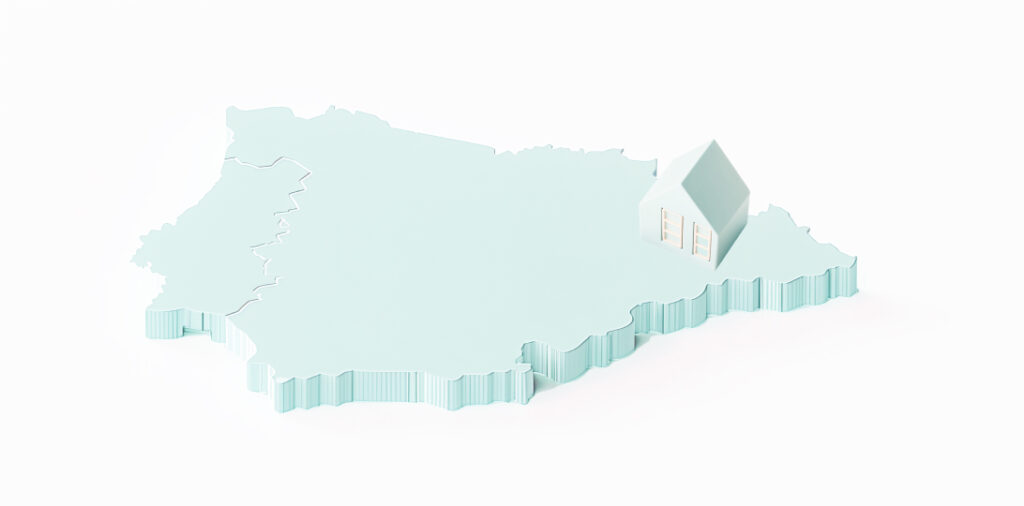 una casa sobre el mapa de España situada en Cataluña