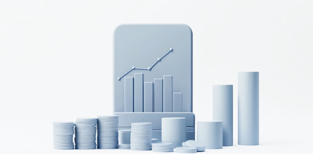 monedas apiladas y gráficos